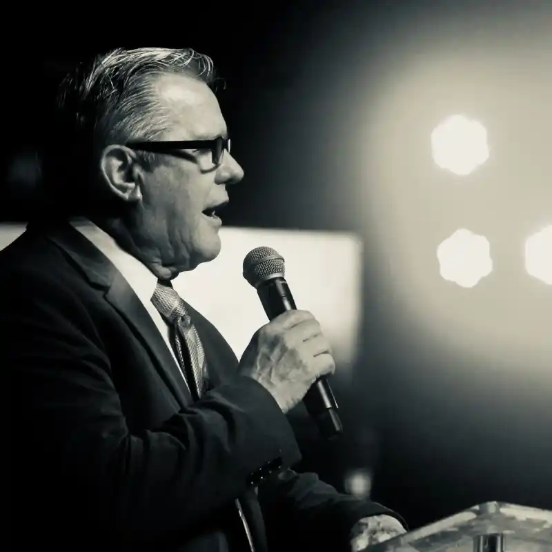 Pastor speaking at The Enlighten Full Gospel Church